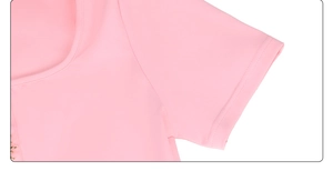 Detail of clean neckline stitching and sleeve seams on a pink square neck swimsuit