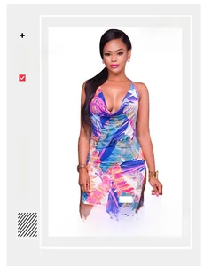 Detail of deep V-neck and tropical leaf print on backless halter dress for women