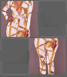 Detail of slim fit white jumpsuit with deep V-neck and golden chain print patterns