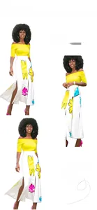 Détail d'une jupe blanche à fleurs taille haute fendue et d'un haut jaune à épaules dénudées