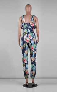 Detail of the back ruffle design and tropical pineapple print on summer jumpsuit