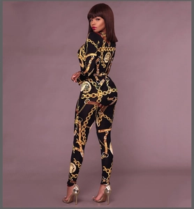 Slim fit long sleeve jumpsuit with gold baroque chain print and elegant silhouette