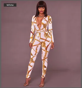 Detail of deep V-neck jumpsuit with gold chain baroque print and waist tie design