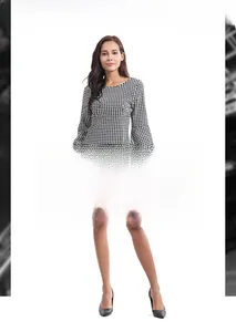 Detail of trumpet sleeves and houndstooth pattern on a slim-fit round neck dress