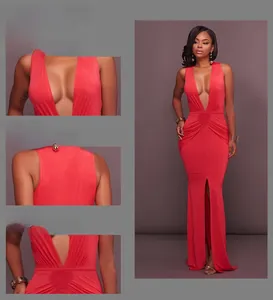 Vue macro du décolleté en V profond et du drapé à la taille sur robe de soirée rouge