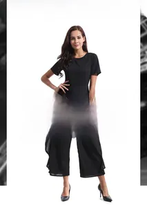 Detail view of high-waist black wide-leg jumpsuit with short sleeves and flowing fabric