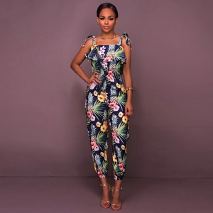 Tropical print sleeveless jumpsuit for women with floral pattern and ruffled neckline