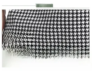 Detail of premium breathable houndstooth fabric with high-quality weave texture