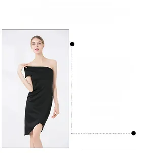 Detail view of a black one-shoulder mini dress with slim fit and asymmetrical hem