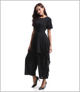 Detail of short-sleeve cinched waist top with matching wide-leg trousers in black
