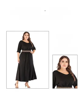 Detail eines böhmischen Gürtels an einem schwarzen Maxikleid in Übergröße mit Rundhalsausschnitt