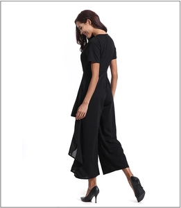 Rear view of black short sleeve high waist jumpsuit with elegant wide-leg cut and belt