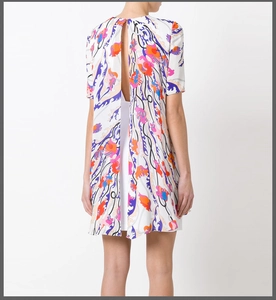 Floral short sleeve dress with unique back slit design and abstract colorful print