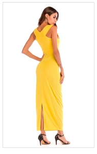 Detailed back view of a slim fit lemon yellow maxi dress showing the sexy rear slit