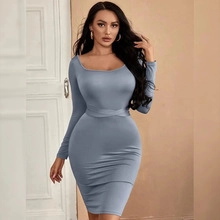 Detailed view of the square neck and crossover waist on a light blue bodycon dress