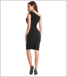 Detail view of the sleek ruffled shoulder and slim-fit back design of the black V-neck dress