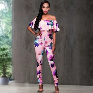 Pink floral off-shoulder jumpsuit with ruffled neckline and slim fit silhouette