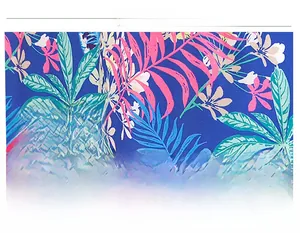 Close-up of tropical floral print fabric on navy blue short sleeve summer dress
