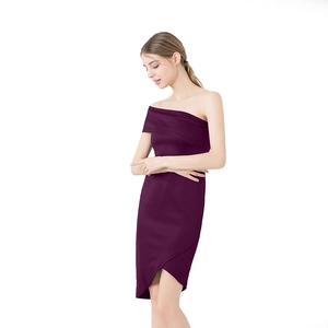 Detail view of deep purple one-shoulder dress with layered ruffles and asymmetrical hem