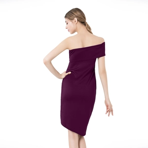 Detail view of the sleek deep purple bodycon dress with irregular hem and one shoulder design