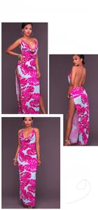 Dettagli del vestito lungo schiena scoperta con stampa di foglie di palma rosa e spacco laterale