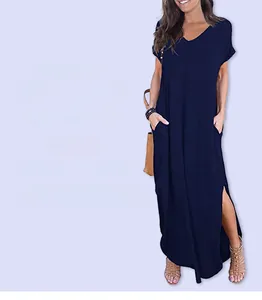 Detail view of the deep blue V-neck dress featuring side slits and functional pockets