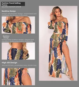 Detail view of tropical leaf print dress featuring off-shoulder neck and high side slit