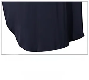 Detailed close-up of loose-fitting hemline with double-stitched edges in navy blue satin