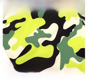Close-up of vibrant camouflage pattern on stretch fabric with digital printing detail