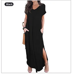 Detail view of black V-neck maxi dress featuring side pockets and high side slits