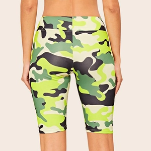 Women's high waist camouflage yoga shorts with neon green and dark green pattern print
