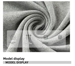 Macro detail of breathable grey ribbed knit fabric showing elastic texture and soft material