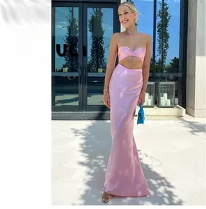 Detail view of pink satin cami set featuring a cropped top and high-waist maxi skirt