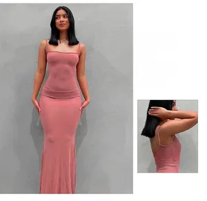Detail of dusty rose slim fit maxi dress with thin straps and a square neckline