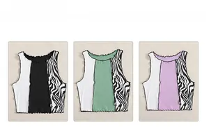 Detailed view of color block crop tank tops with ribbed texture and lettuce edge trim