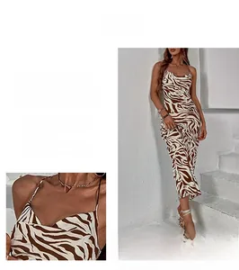 Detail showing the zebra print texture and cowl neck design of the slim fit slip dress