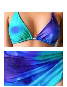 Detail view of lace-up bikini with vibrant blue purple gradient tie-dye fabric textures