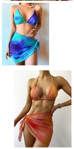 Detailed view of women's 3-piece bikini set with gradient sarong in blue and orange hues