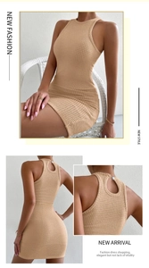 Detail of waffle knit sleeveless mini dress featuring an open back with button closure