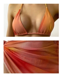 Detail of the gradient orange mesh beach sarong and halter neck bikini swimwear set
