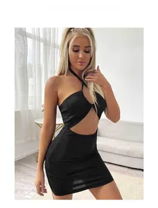 Close-up of black halter neck cutout mini dress featuring slim fit and backless design
