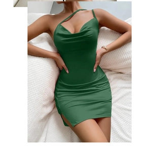 Detail of dark green knit dress with cowl neck, asymmetric straps and side slit hemline