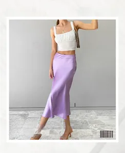 Detail shot of light purple satin midi skirt with elegant drape and silky texture