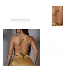 Détail de robe dos nu en satin champagne avec laçage croisé et texture métallique