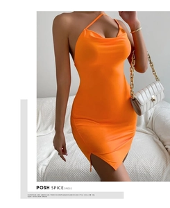 Detail of cowl neck design and side slit on orange backless knit midi dress
