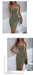 Détail de la robe midi vert sauge avec ceinture nouée et ourlet asymétrique élégant