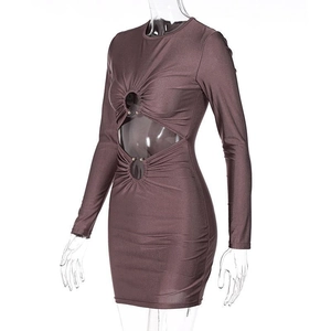 Detail view of cut-out design with metal ring on brown long sleeve bodycon dress