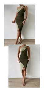 Detail view of the asymmetric split hem and contrast color patchwork of the dress
