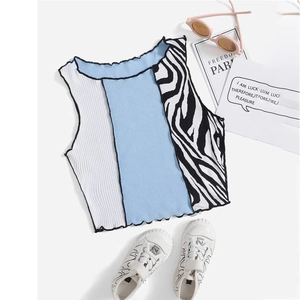 Women's color block ribbed knit crop top featuring zebra print and contrast stitching
