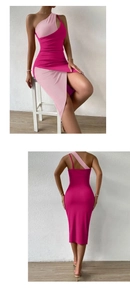 Detail view of pink rib-knit midi dress featuring one-shoulder design and side high slit